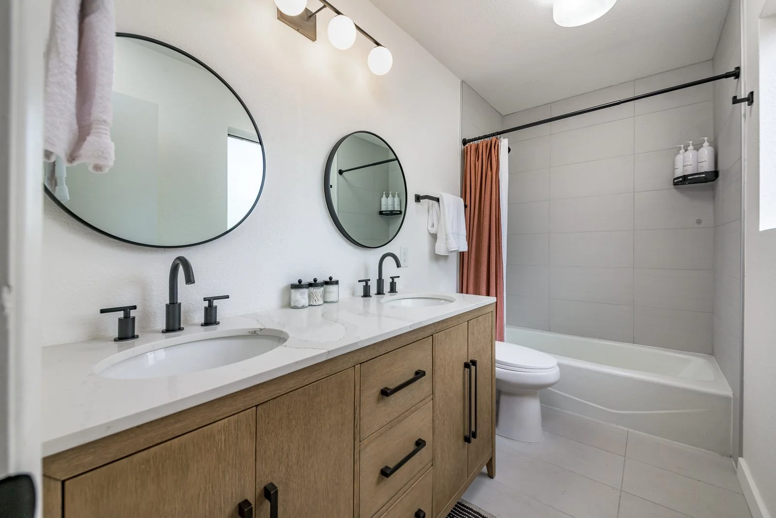 Bathroom tub and shower combo with double vanity in Munds Park
